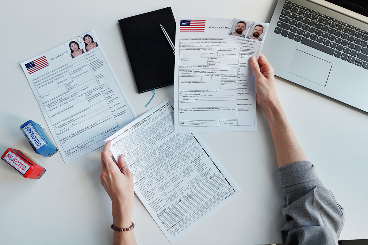 Checking Visa Application Papers At Office 2022 05 19 14 44 32 Utc